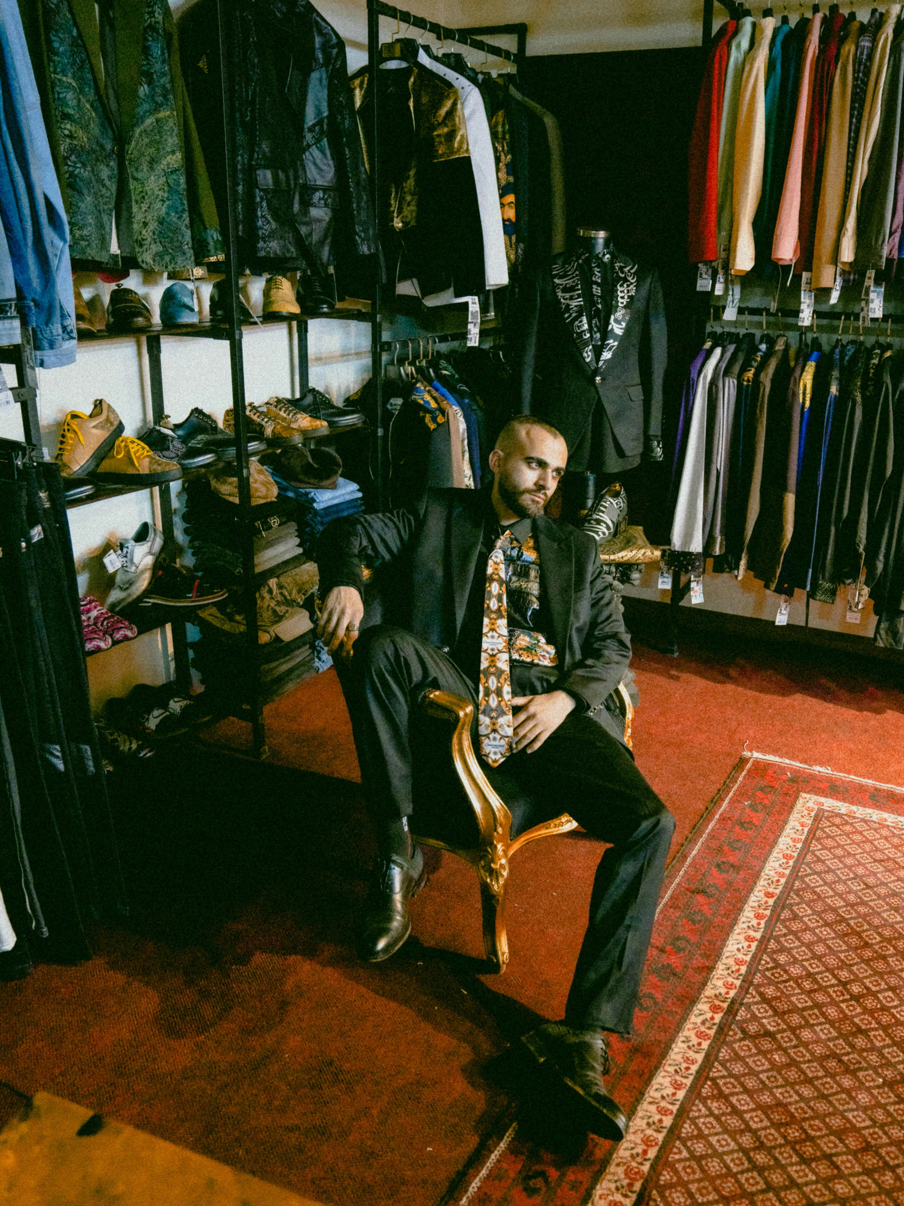 A sophisticated gentleman wearing a bespoke double-breasted suit, representing luxury menswear and sartorial excellence.